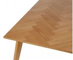 Mesa de comedor con superficie de parquet de espiga